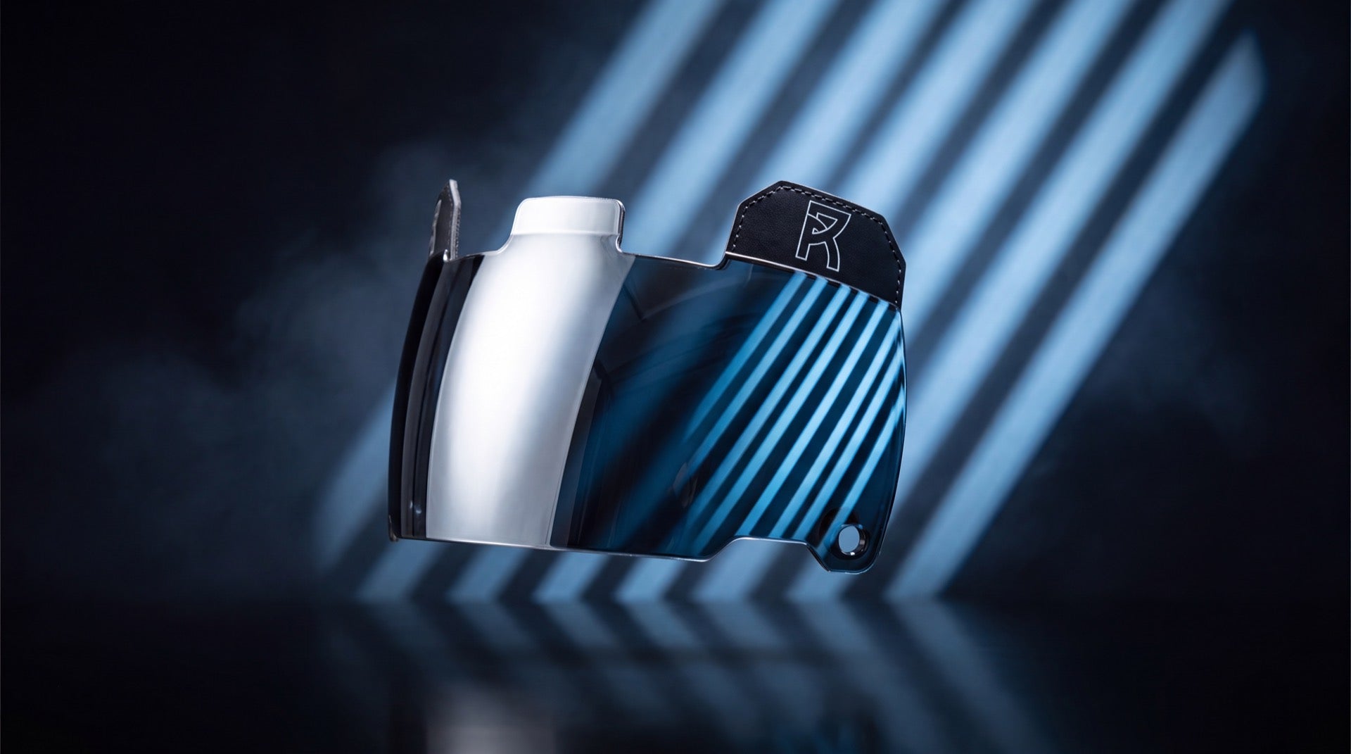 Reyrr VISION Chrome Mirror football visor floating in cold blue striped studio light, cover for the football visor buying guide