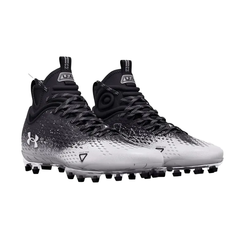 Black and white UA Spotlight LUX MC 2.0 cleats with lightweight breathable upper and multidirectional traction studs.